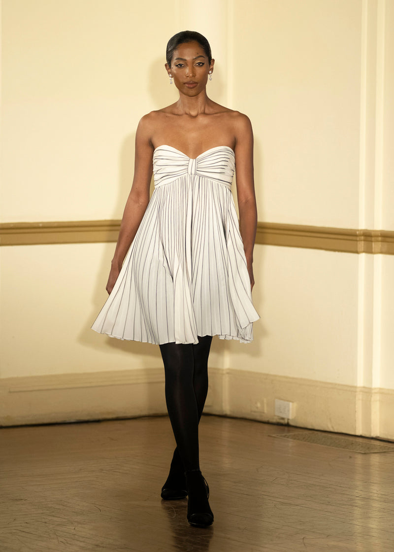 Look 3: Alabaster Draped Bustier with Striped Pleated Skirt